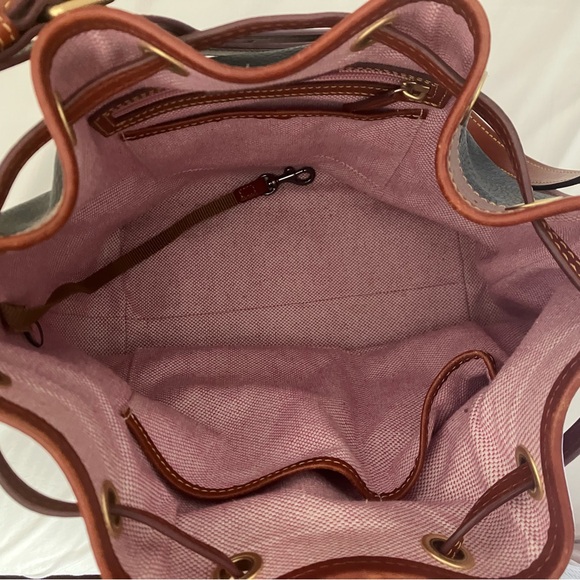 Dooney & Bourke Black and Brown Bucket Bag with Timeless Elegance - Picture 8 of 11